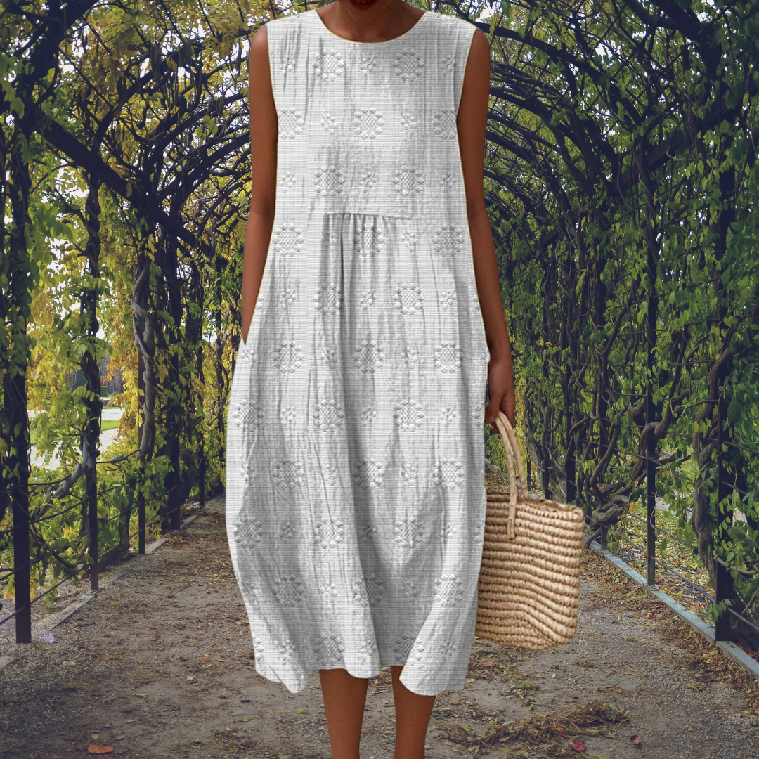Aikaterini – Elegantni bezrukavnik sa džepovima