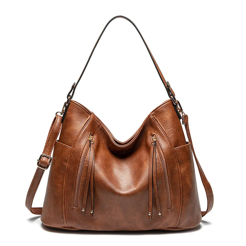 Coralie™ | Usnjena torba s frufruji