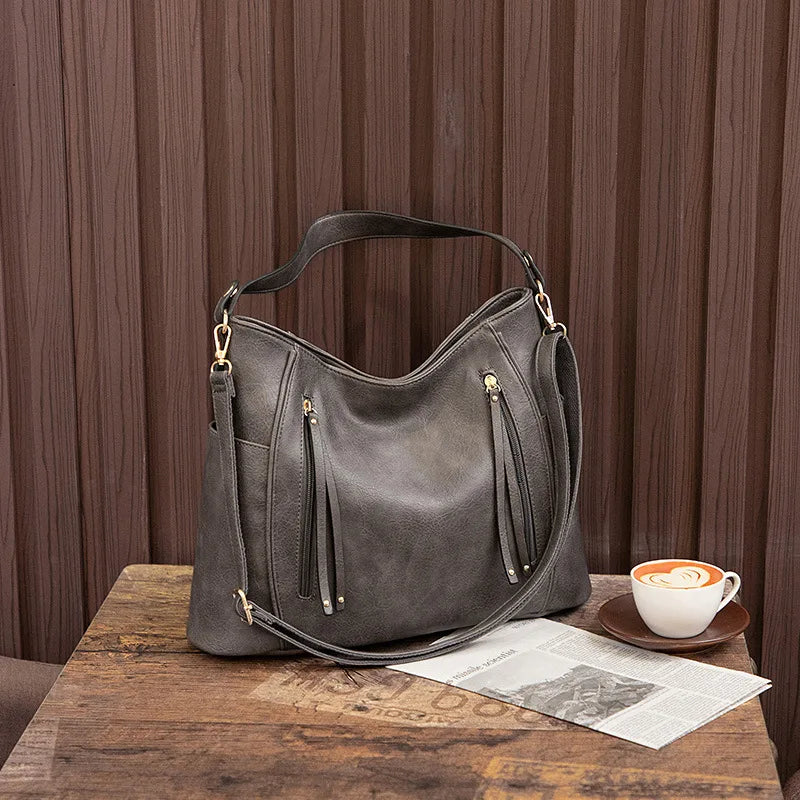 Coralie™ | Usnjena torba s frufruji