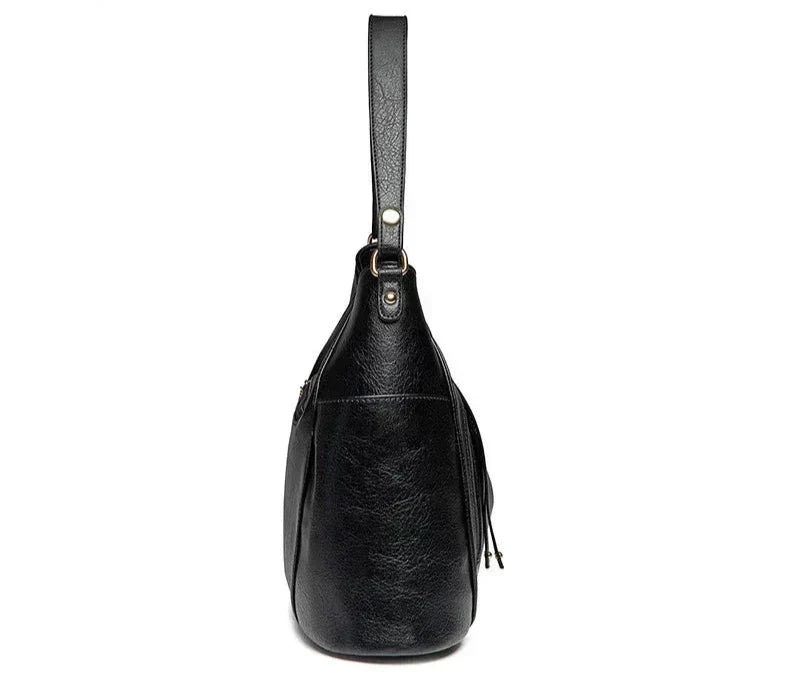 Coralie™ | Usnjena torba s frufruji